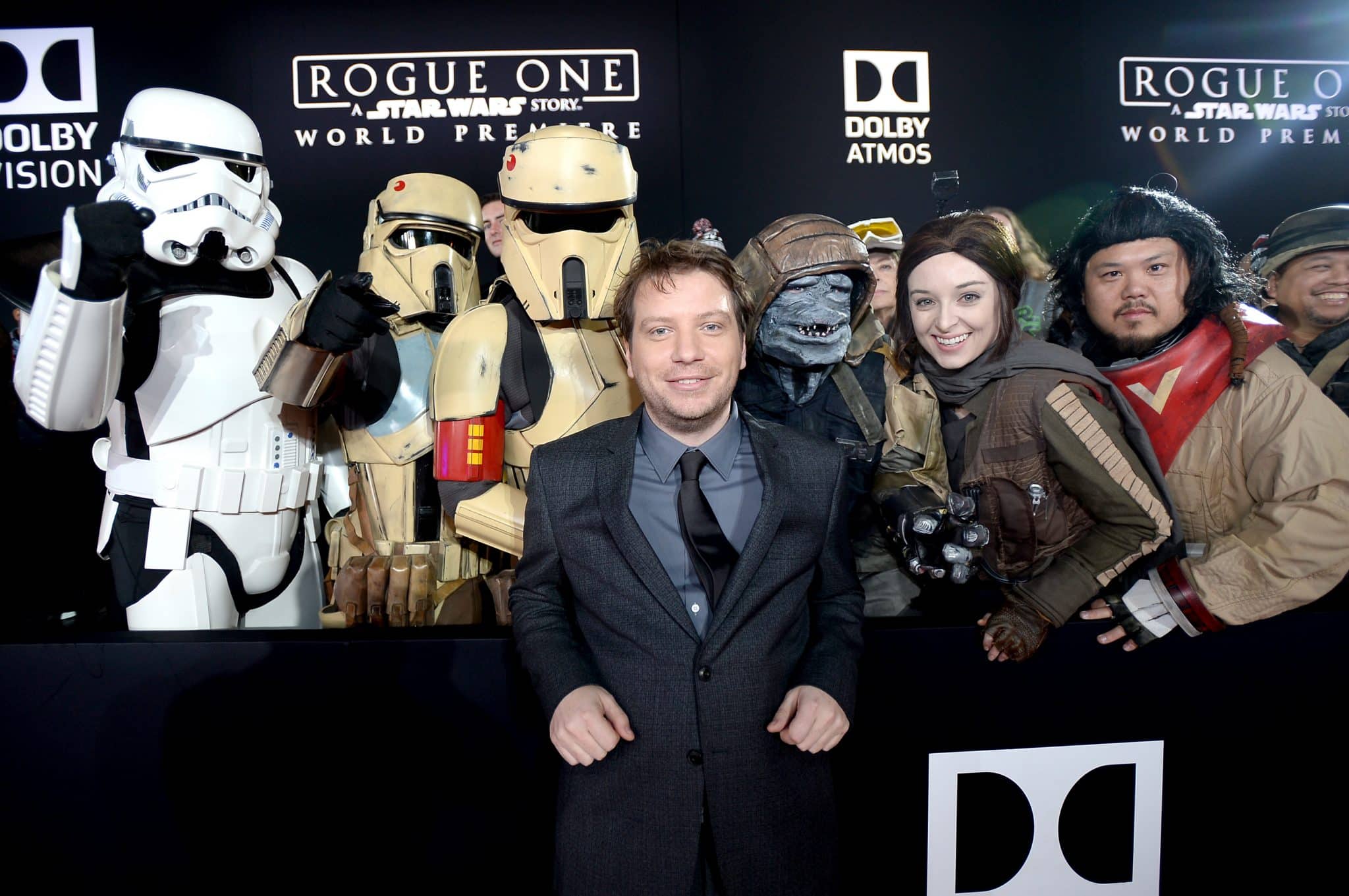 HOLLYWOOD, CA - DECEMBER 10:  Actor Gareth Edwards (C) poses with costumed fans at The World Premiere of Lucasfilm's highly anticipated, first-ever, standalone Star Wars adventure, "Rogue One: A Star Wars Story" at the Pantages Theatre on December 10, 2016 in Hollywood, California.  (Photo by Charley Gallay/Getty Images for Disney) *** Local Caption *** Gareth Edwards