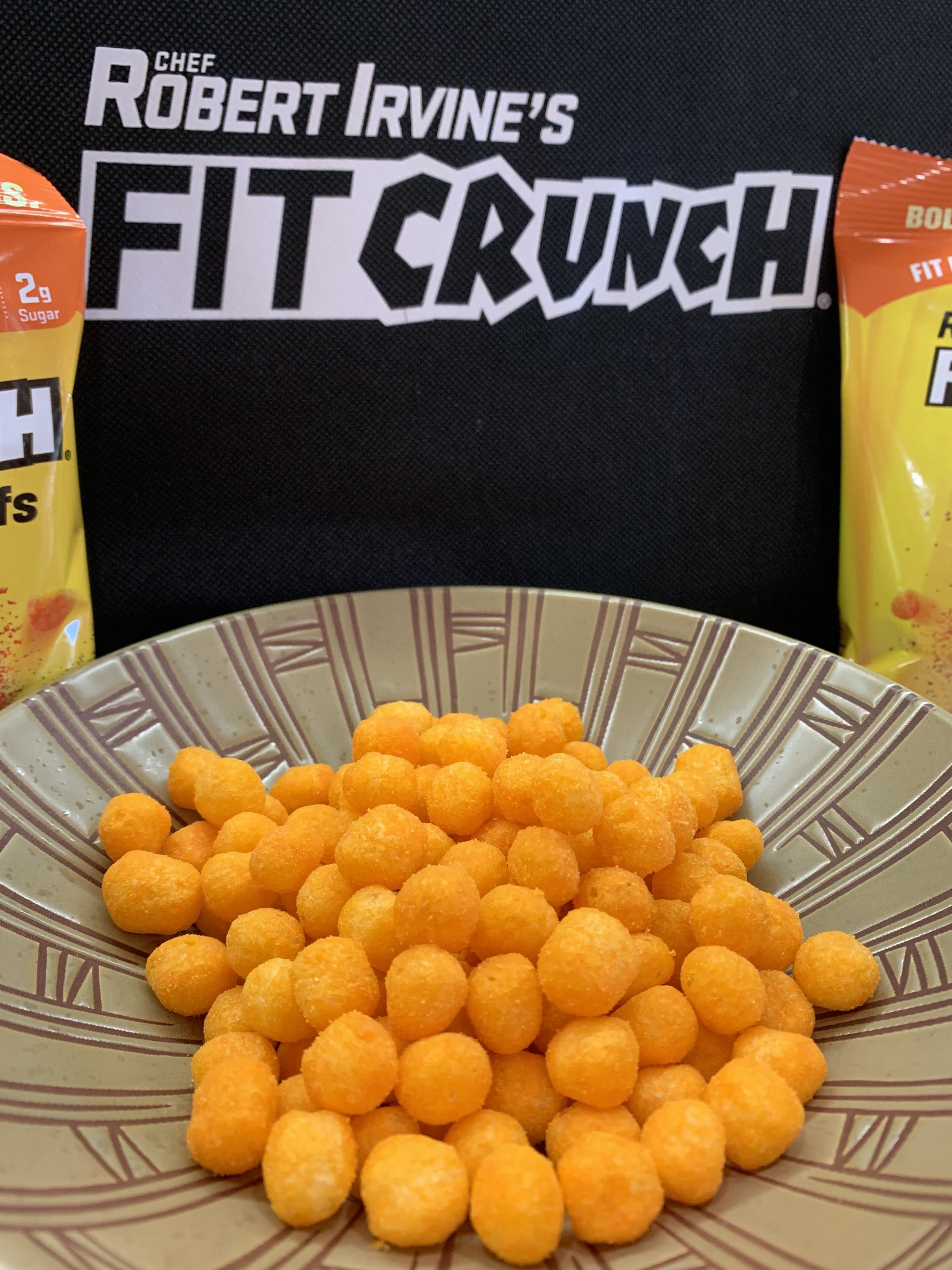 Snack Better with FITCRUNCH® Cheddar Cheese High Protein Puffs